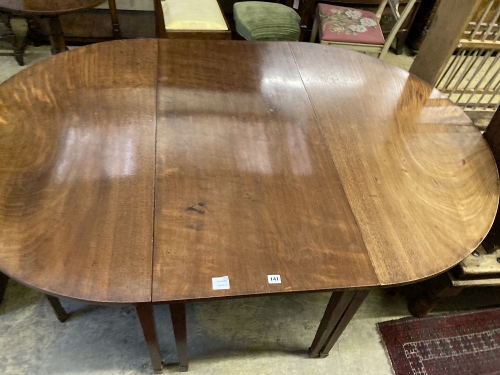 A George III mahogany D end extending dining table, 240cm extended (three spare leaves), width 121cm height 77cm